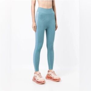 The upside blue soft seamless midi pant; size L